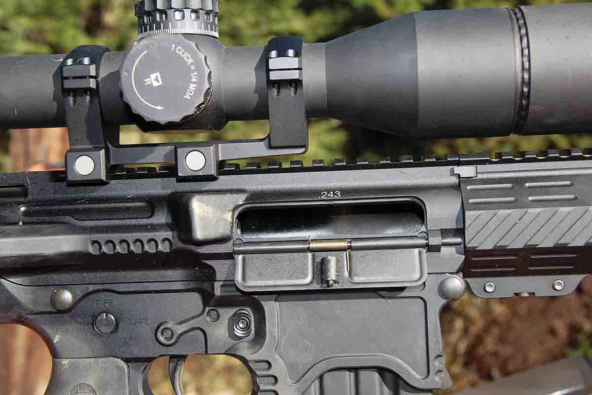 The rifle includes a milled-in brass deflector, which shows it was doing its job by developing a brass wash during testing.